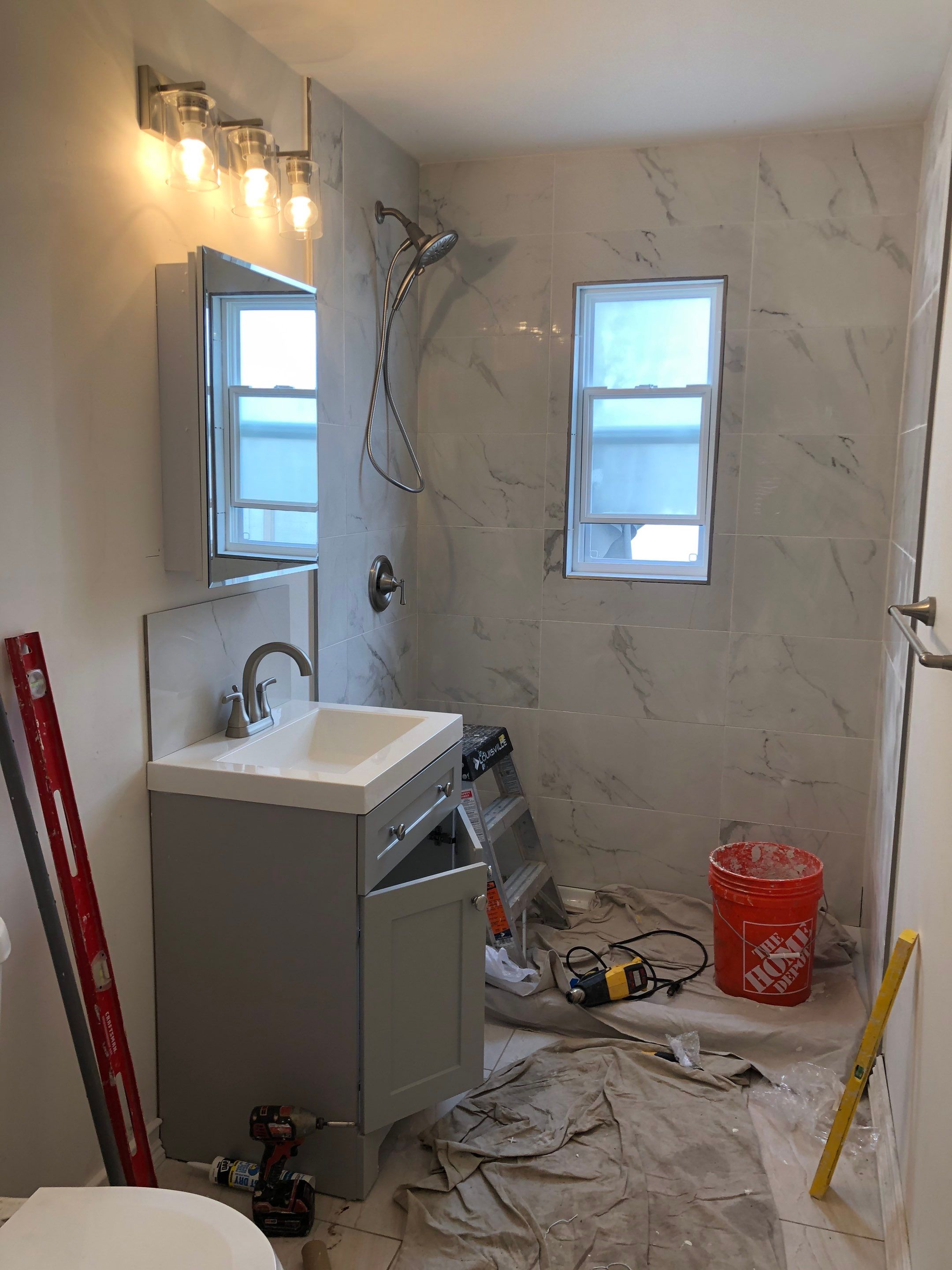 Bathroom Remodel using Tile by Home Concepts Construction