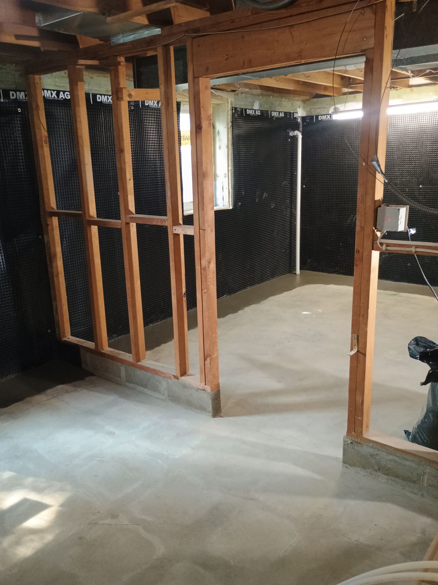 Interior Drain Tile & Wall Drainage in Southwest Minneapolis by Waterproofing Northeast