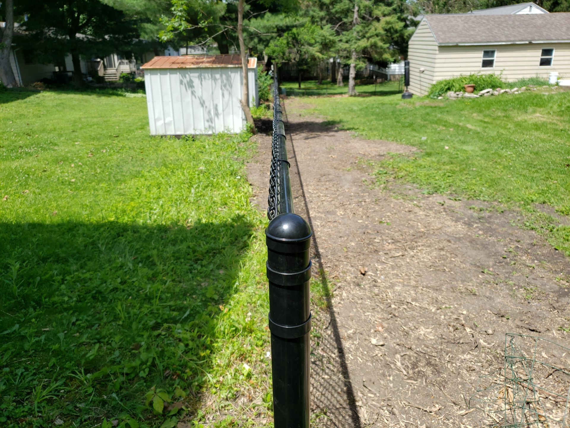 Black Chain Link Fence Installation in Cedar Falls by Perfect Picket Fence and Stain