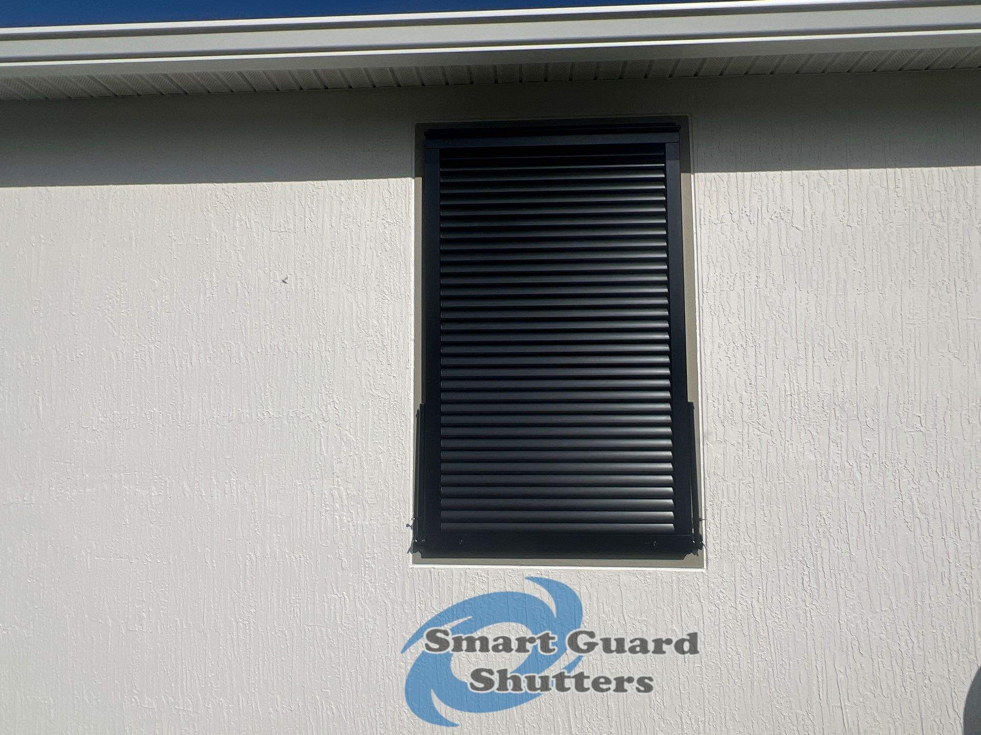 Impact Bahamas in MATTE Jet Black by Smart Guard Shutters