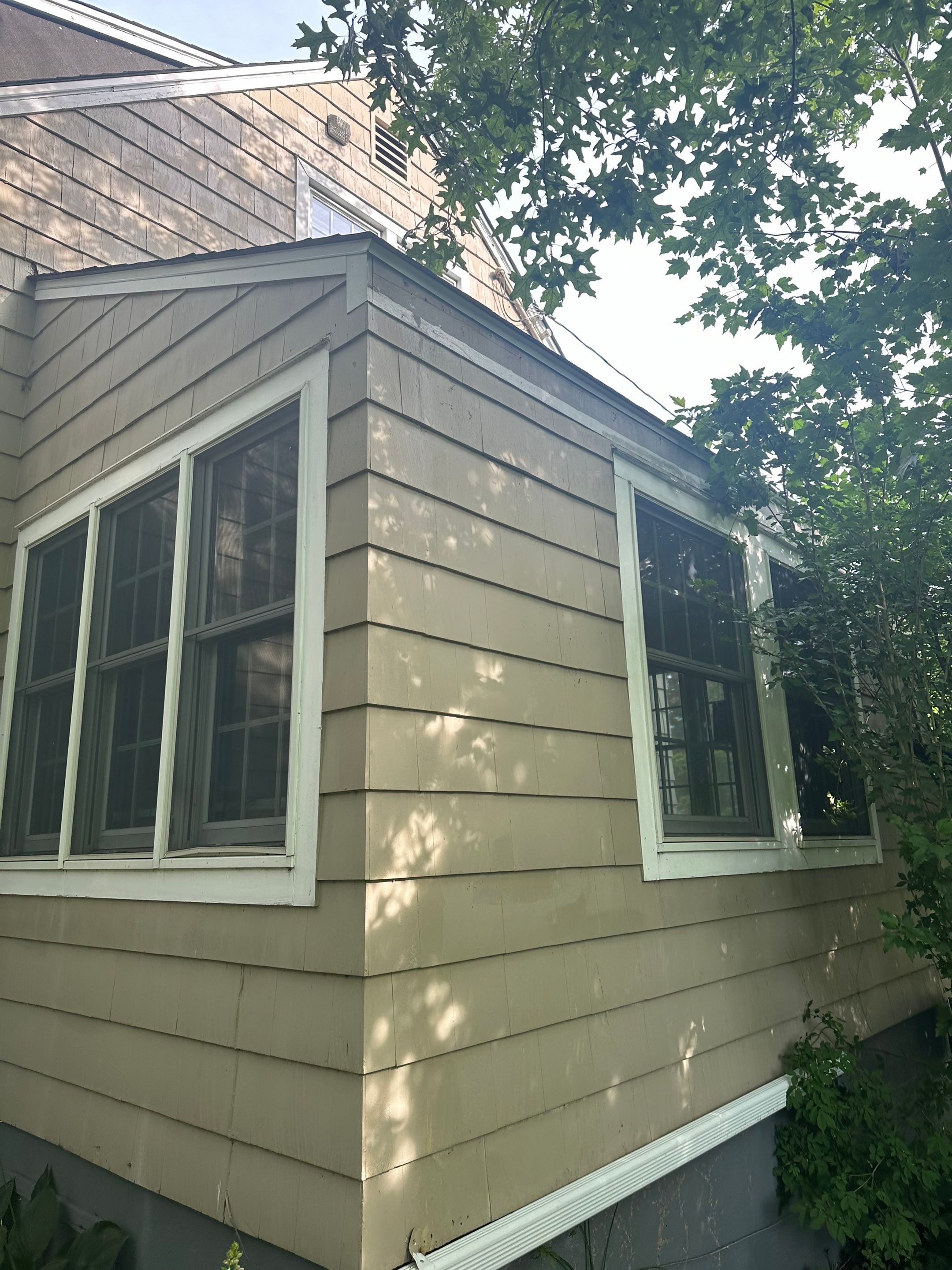 Complete Exterior Estate gray with Pacific Blue Siding by A Plus Exterior