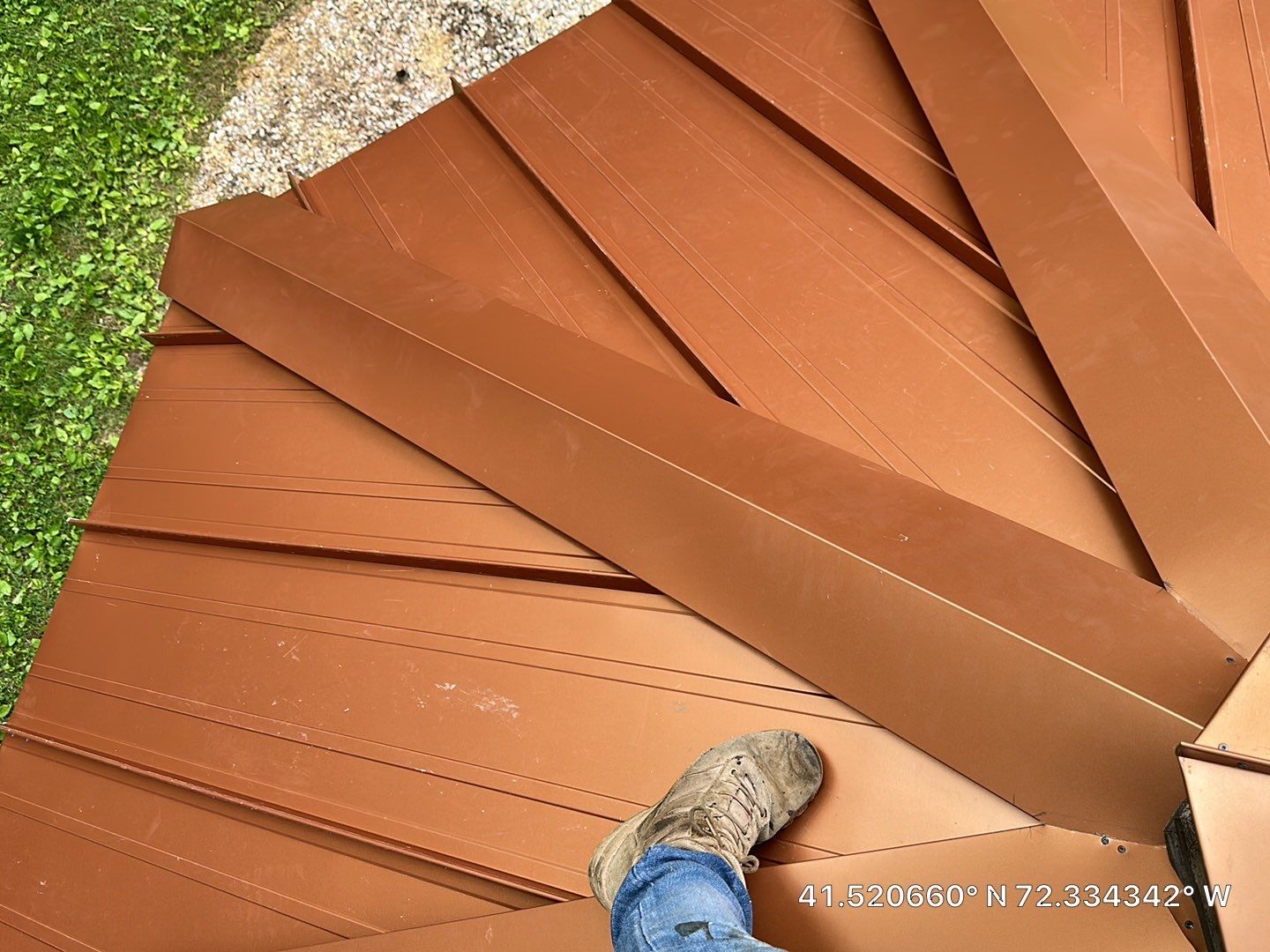 Residential Roofing Installation using Copper Penny Metal Roof by A Plus Exterior