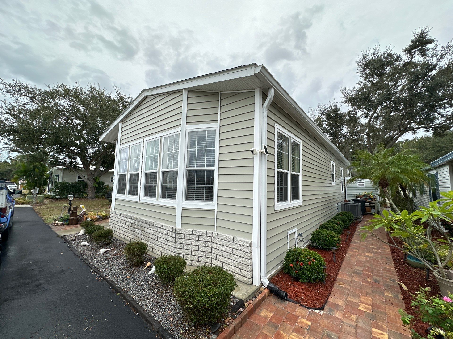 Gutter Cleaning and House Washing Services  by Sunshine AquaWash