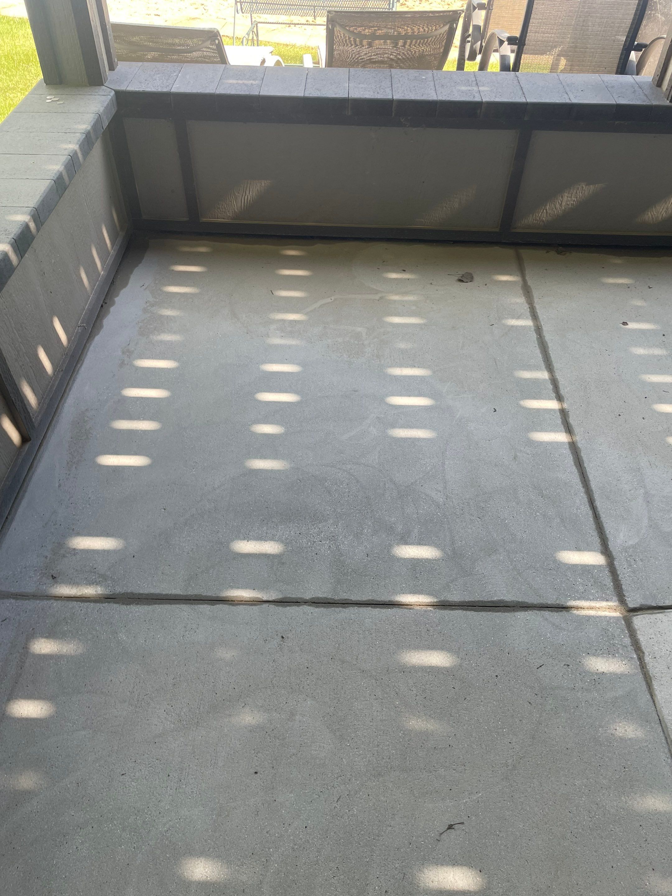 Lakefront Screened Patio Concrete Coating Installation in Wentworth by Select Painting, Coatings & Garage Cabinets
