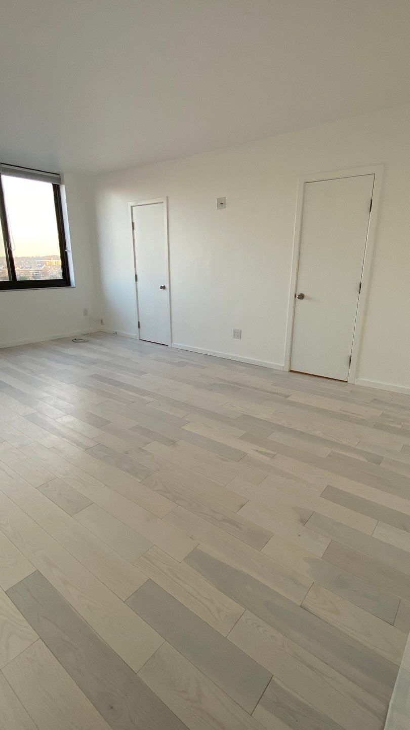 Apartament renovation  using Harwood floor  by Jesus Master Handyman LLC 