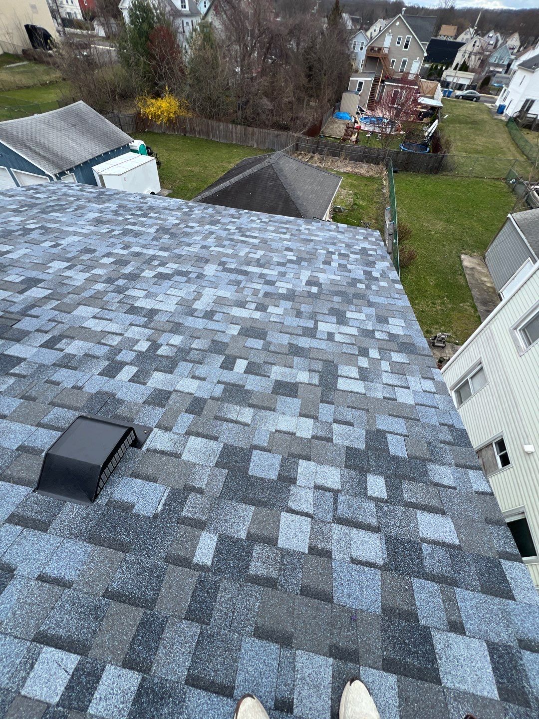 Atlantic Blue Shingles by Reimagine Roofing