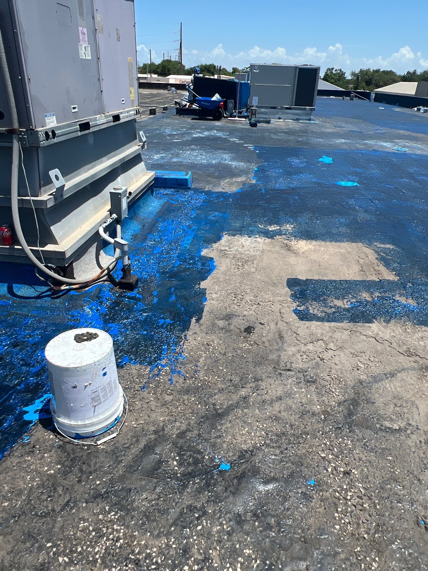 Dirty leaking Gravel Roof by Bayfront Roofing and Construction