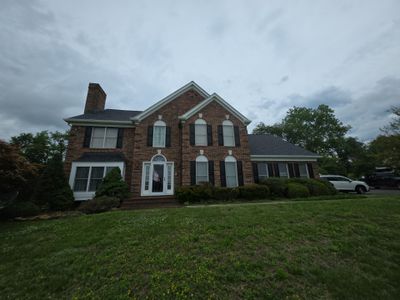 Vinyl Window Replacement for Two-Story Brick Home in Upper Marlboro