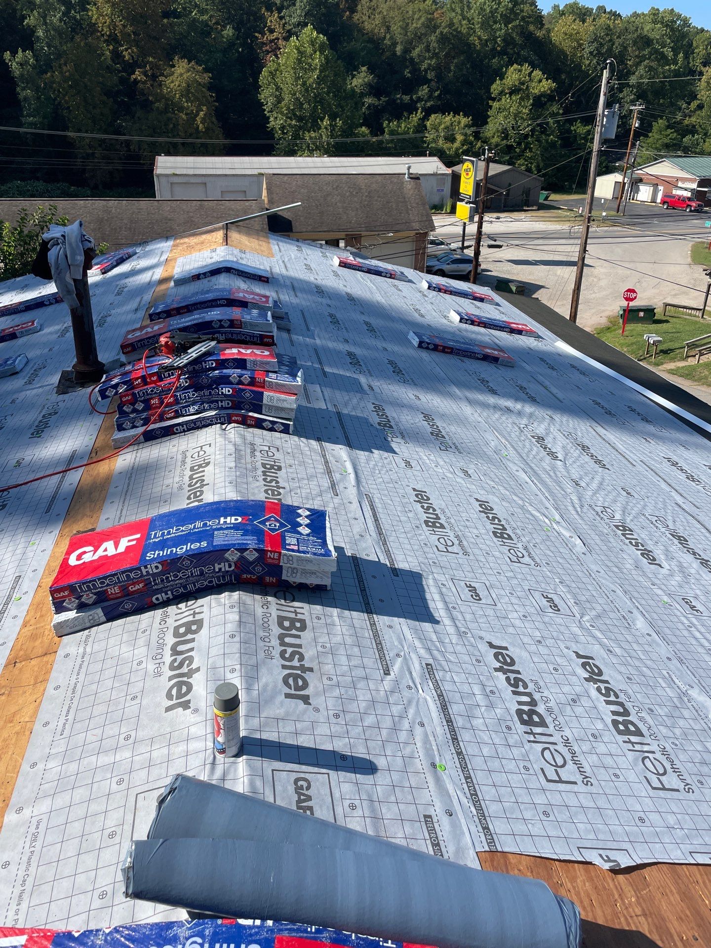 Residential Roofing Installation using GAF TImberline HDZ Hickory by Rainstoppers Roofing