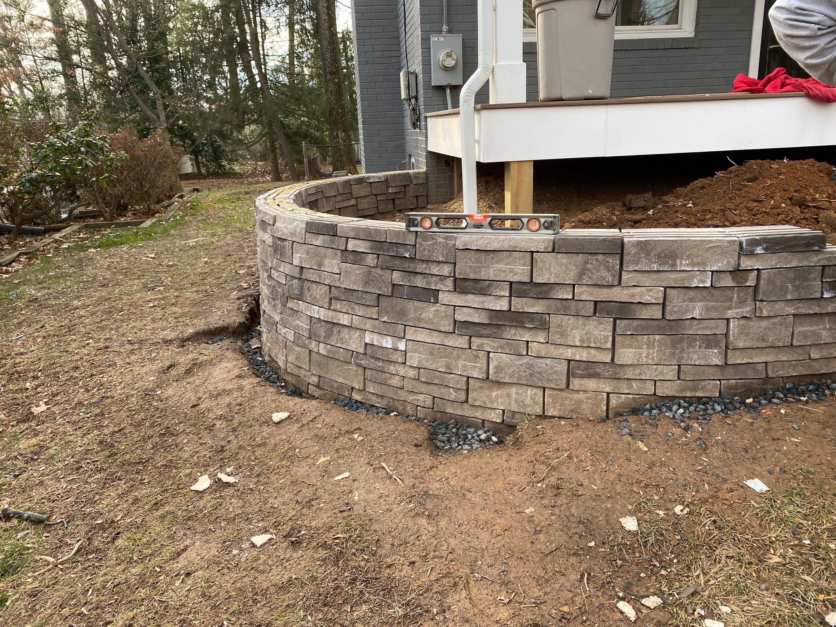 Retaining wall, walkway, small patio and landscape install by The Smet Companies, LLC