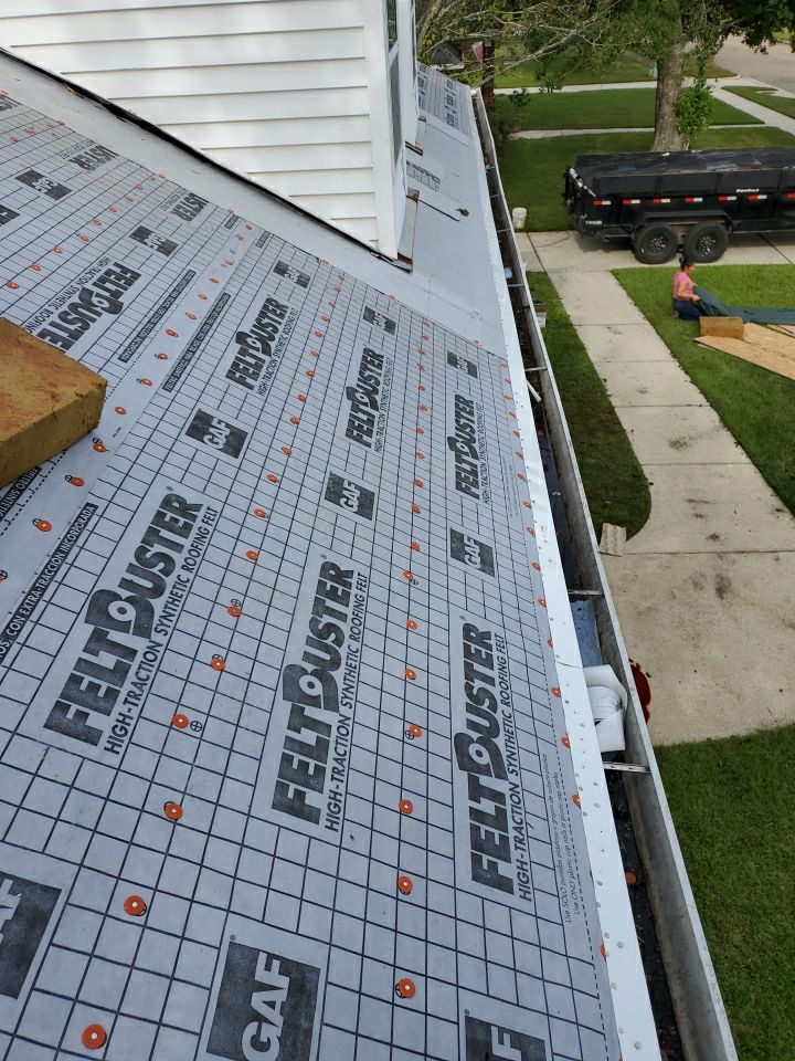 Residential Roofing Installation using Roof Replacement by American Roofing & Construction LLC
