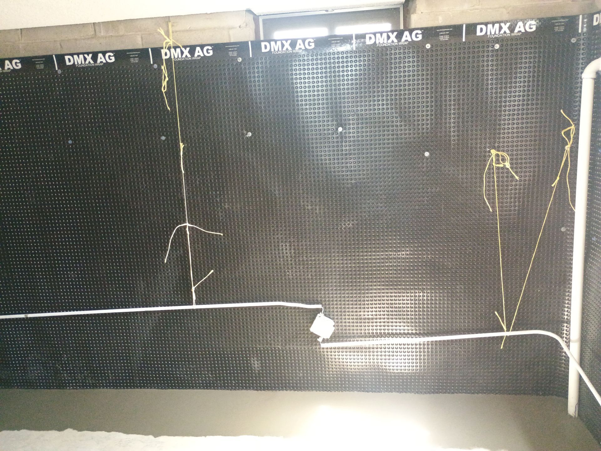 Interior Drain Tile & Foundation Crack Repair in St. Anthony, MN by Waterproofing Northeast