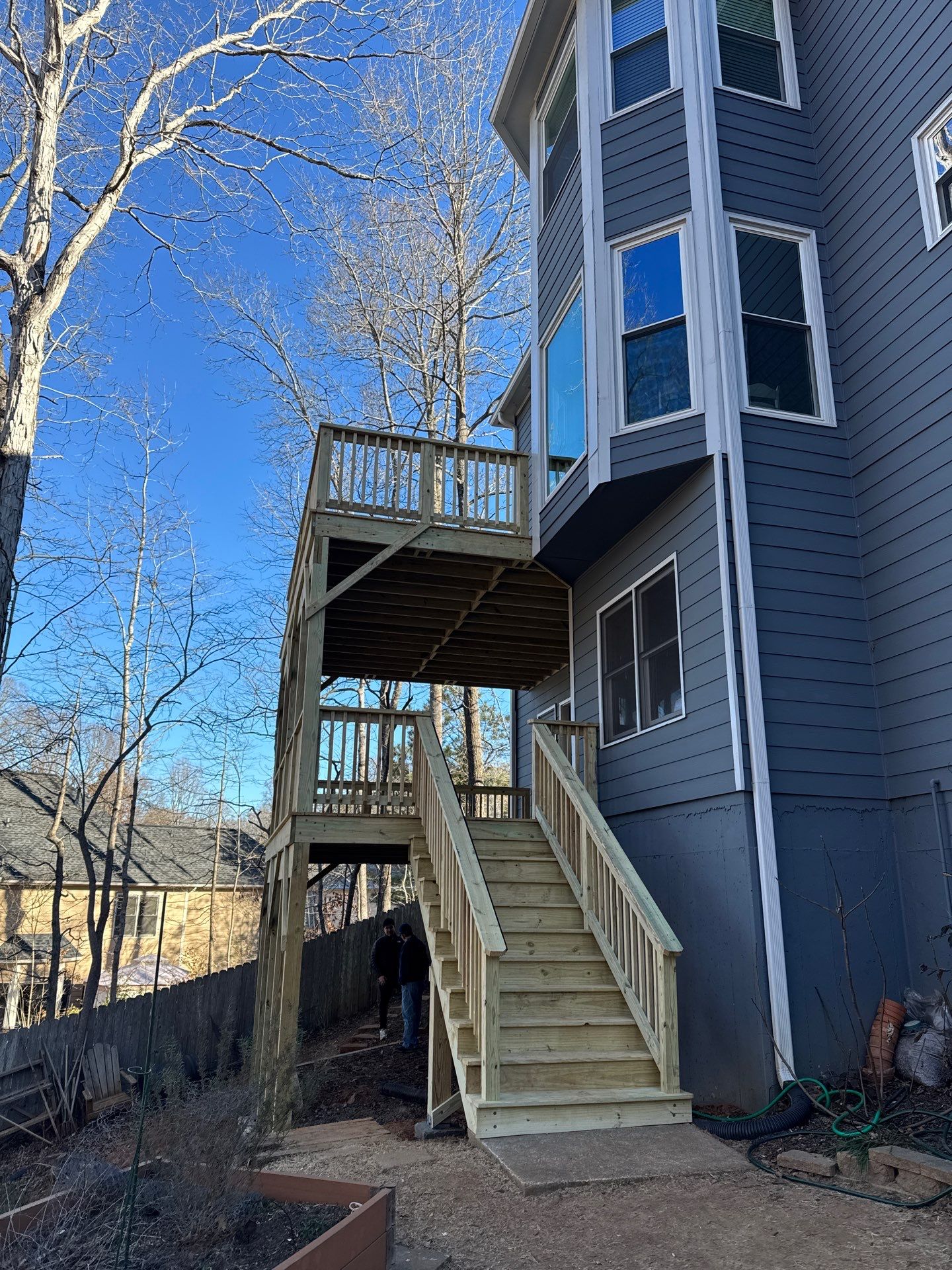 Two-Story Pressure-Treated Wood Deck Installation in Acworth, Georgia by Swift Home Renovations