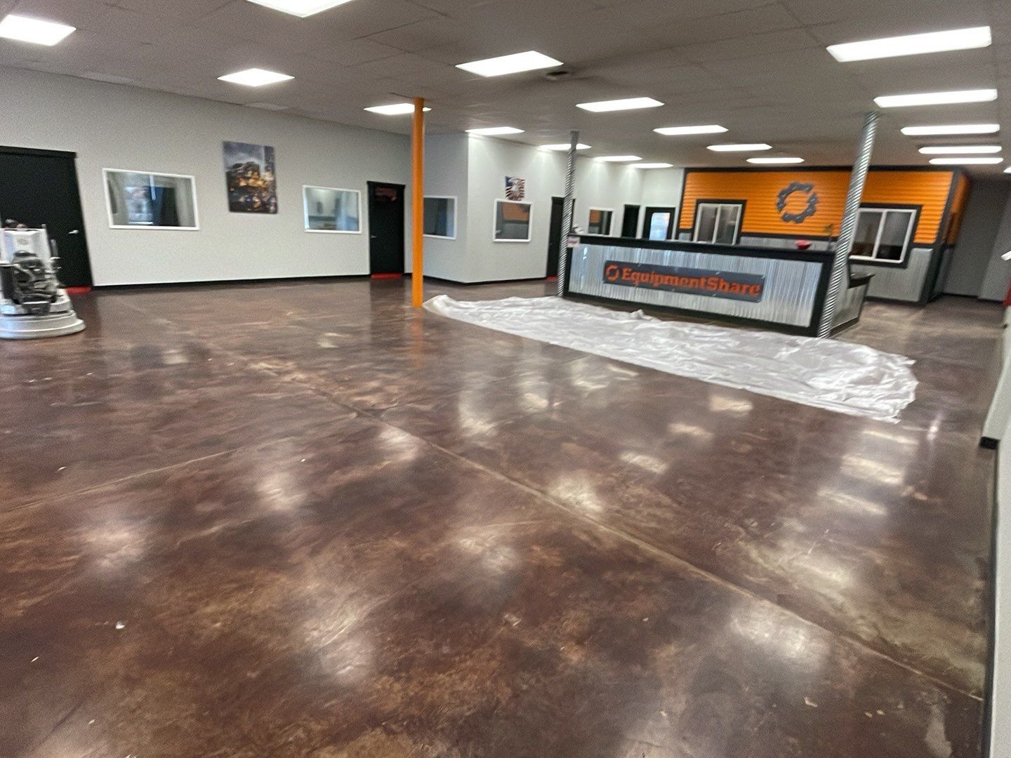 Equipment Share Commercial Floor Transformation using Smoke w/ 5% Orange by Croc Coatings, LLC