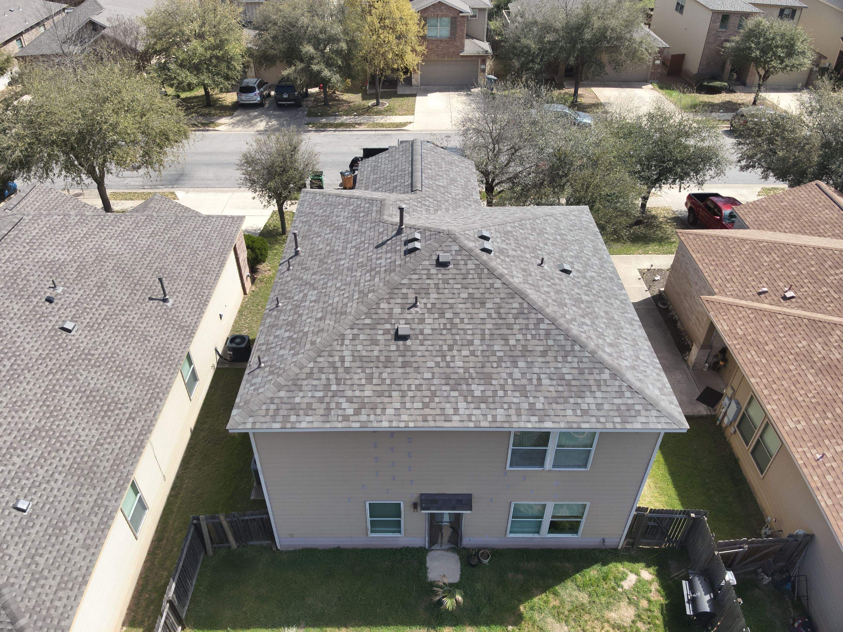 Residential Roof Replacement using Owens Corning - Duration - Driftwood by Action Exteriors Austin
