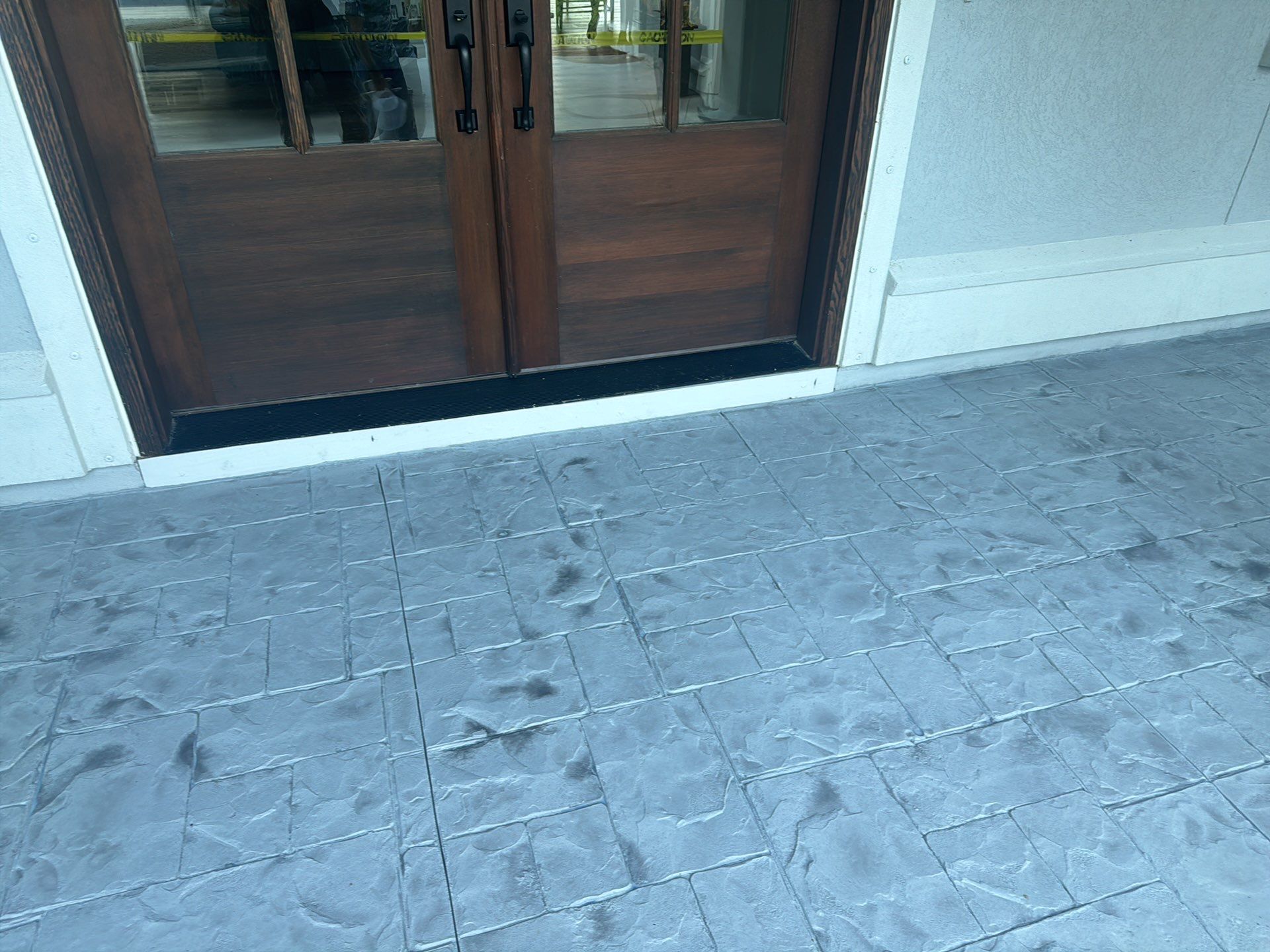 Stamped Concrete Patio and Circular Paver Installation in Hilton Head Island by Lowcountry Scapes, LLC
