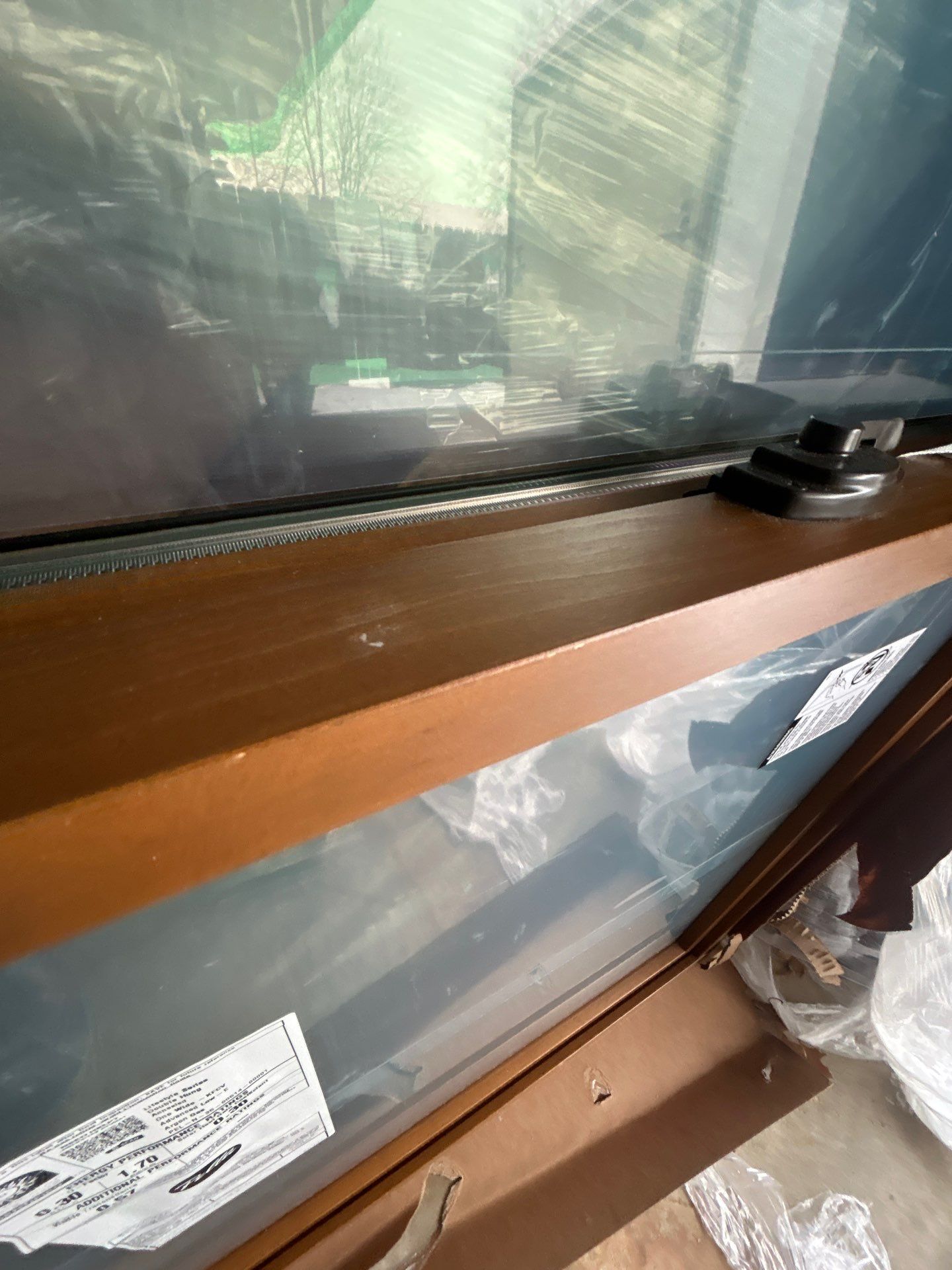 Black-Frame Pella Lifestyle Upgrade on a Partial Brick Home by United Windows and Siding LLC