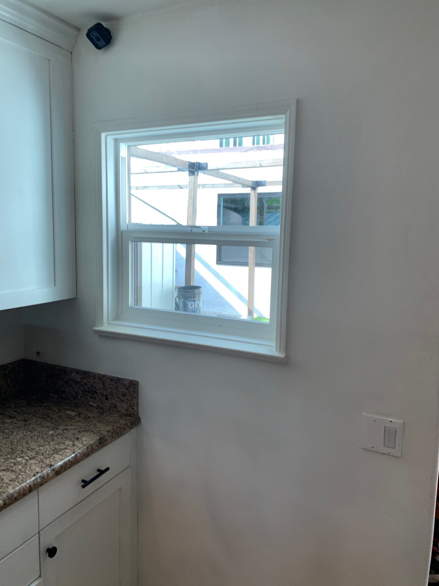 Window Installation using Black Anlin windows by American Window Company