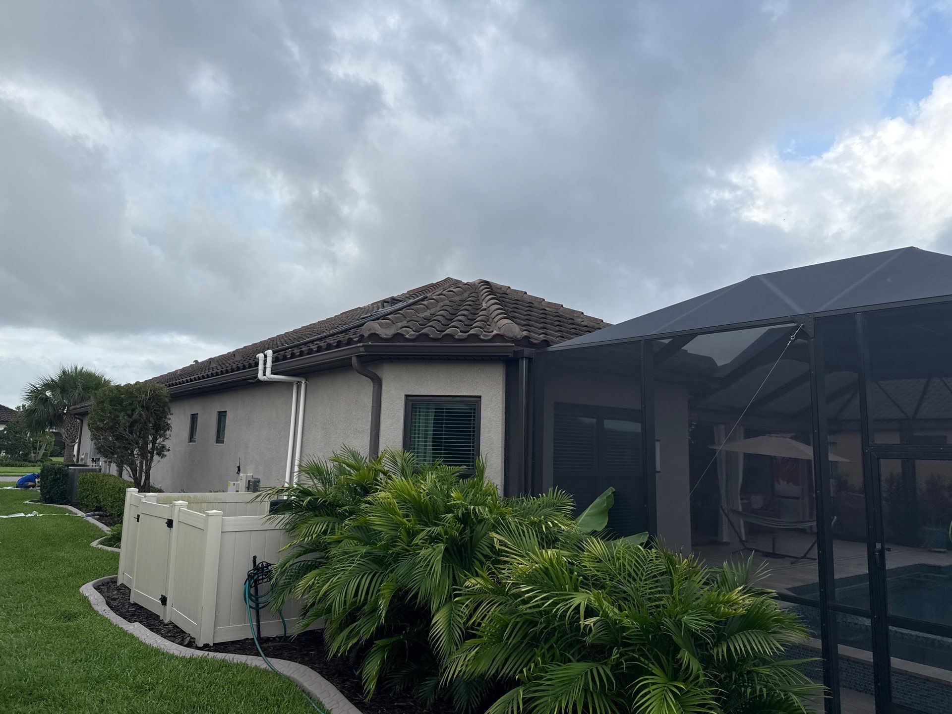 Neighboring Tile Roof Cleaning with Gutter Runoff Control – Palmetto, FL by Sunshine AquaWash