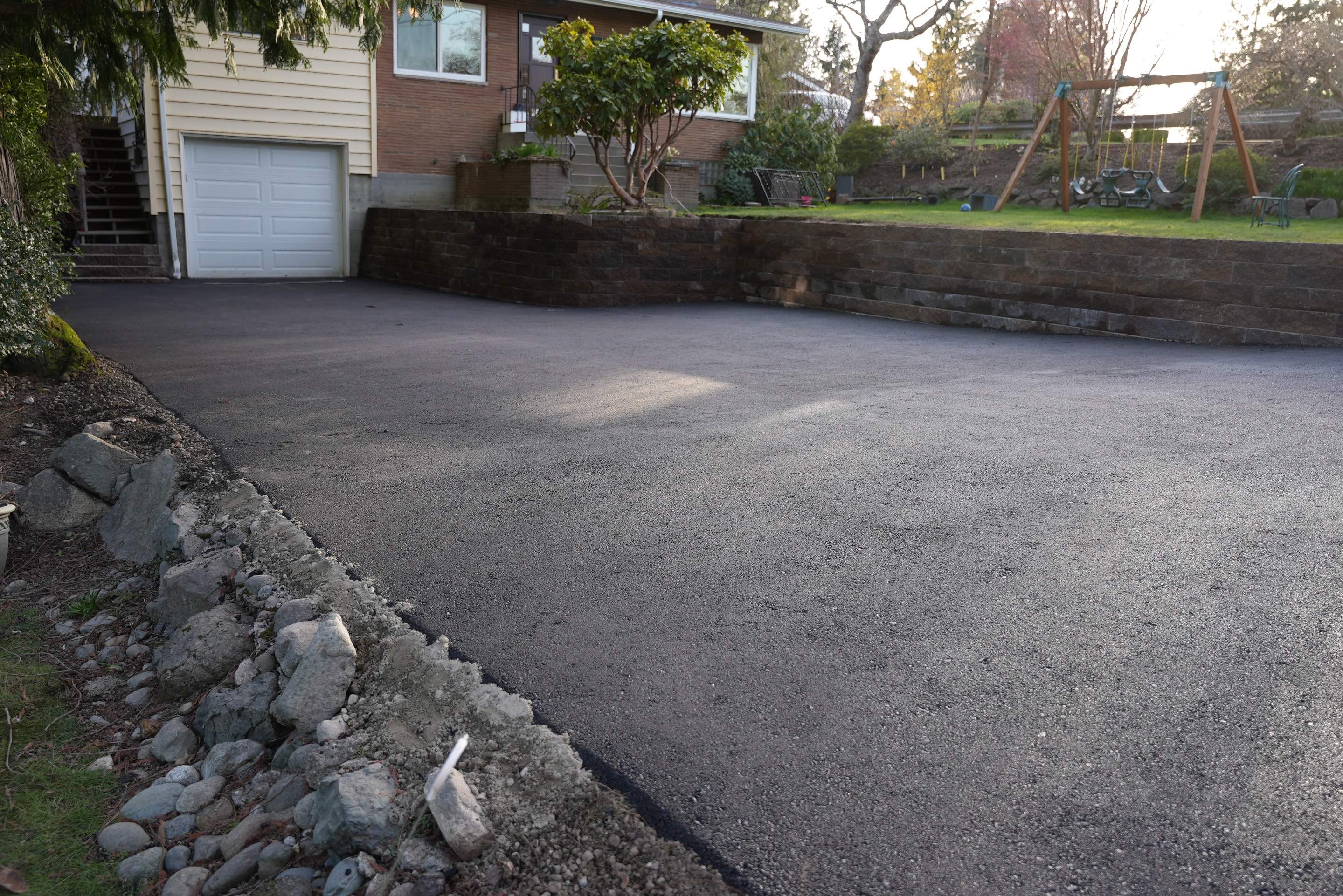 Lorra | Asphalt Driveway Repair & Retaining Wall by Jireh Asphalt & Concrete Inc 
