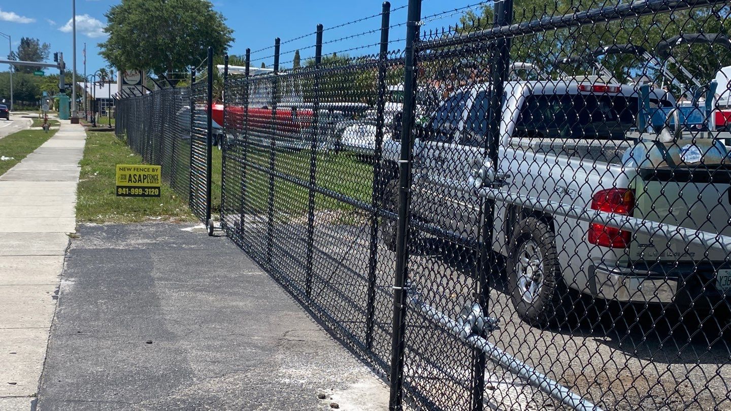 Parrish, FL 6+1 Black Commercial Chain-Link Fence by Asap fence and gates, LLC