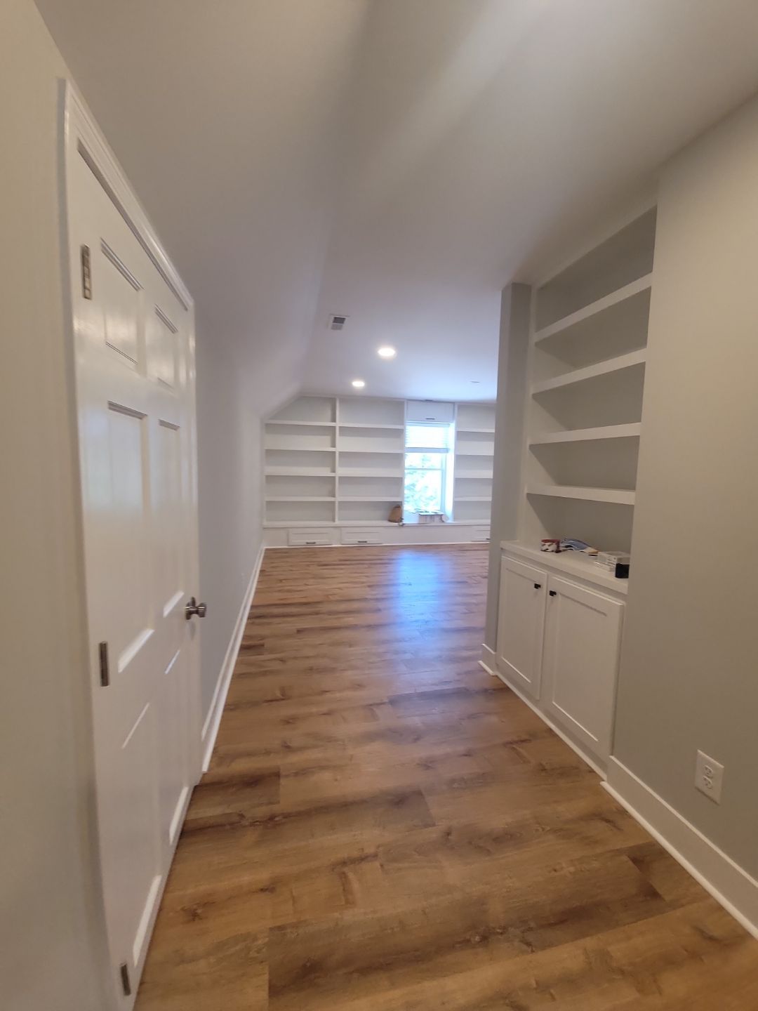 From Rafters to Retreat: An Attic Transformed with a Luxe Bath Escape by Elite Remodeling and Design LLC