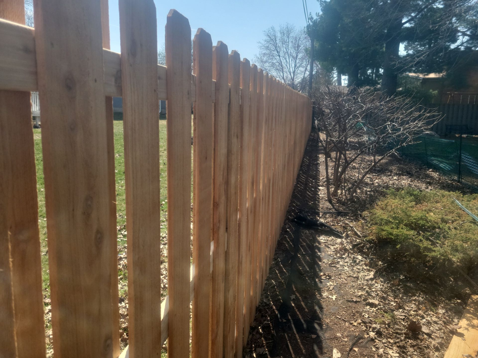 Cedar Shadowbox Wood Privacy Fence Installation in Cedar Falls by Perfect Picket Fence and Stain
