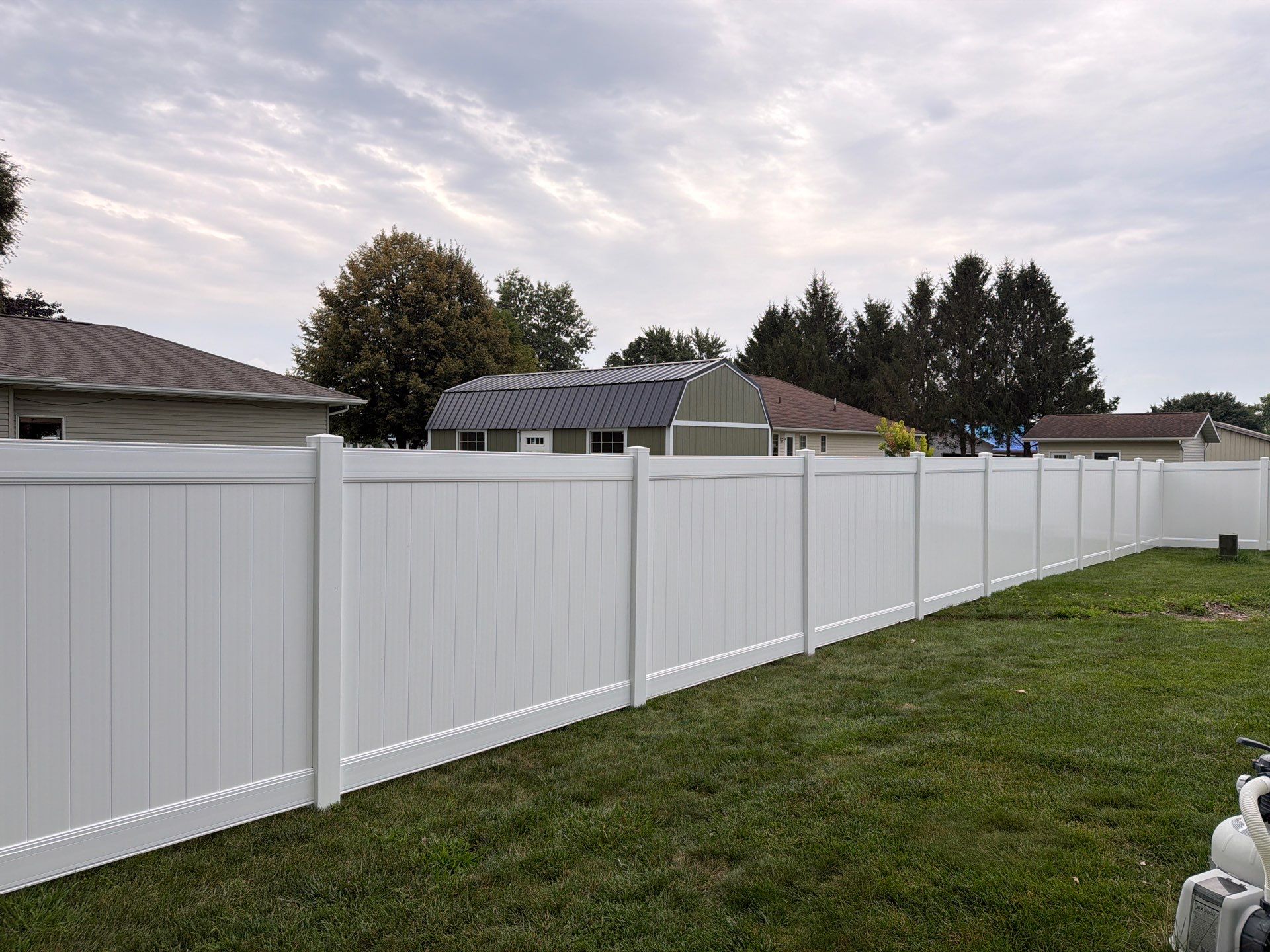 White Vinyl Privacy Fence and Double Gate Installation in Jesup by Perfect Picket Fence and Stain
