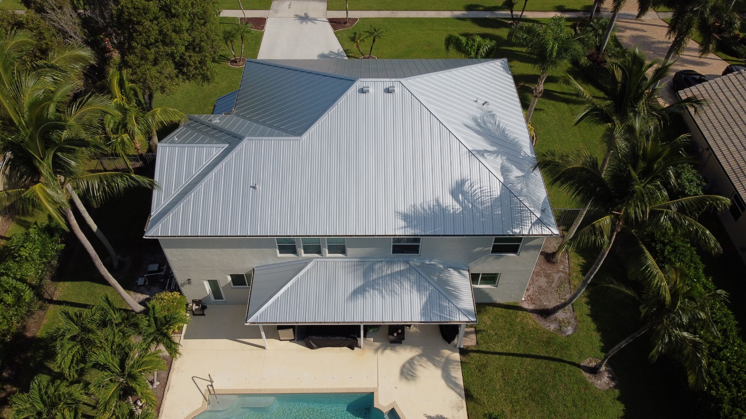 Residential Roofing Installation using 1" Nail strip metal roof by BLUES BROTHERS CONSTRUCTION CORP