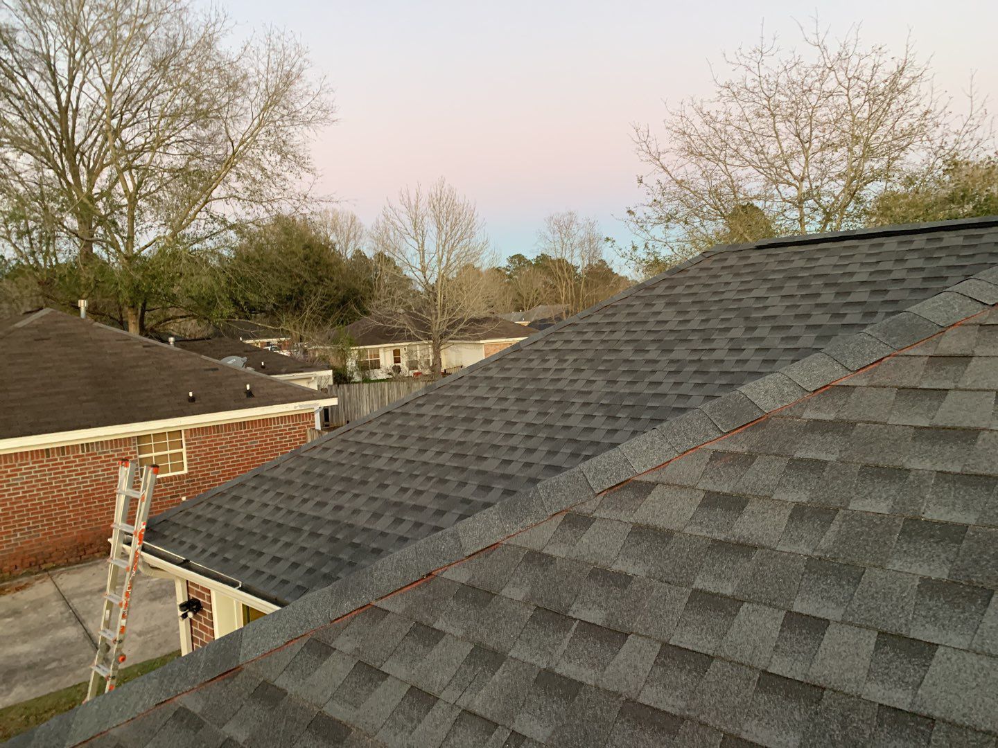 Residential Roofing Installation using Roof Replacement by American Roofing & Construction LLC
