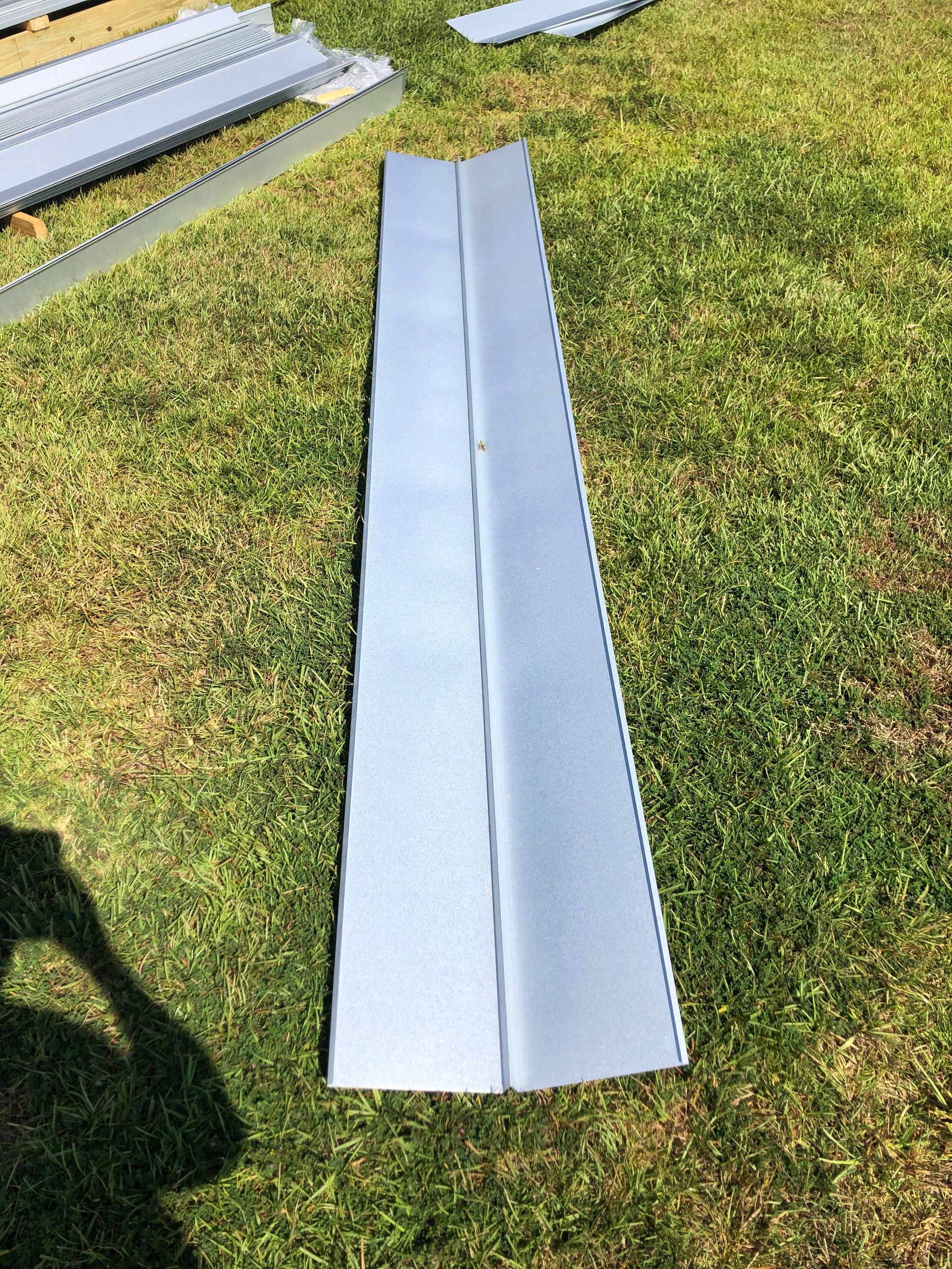 Residential Roofing Installation using Metal roofing by American Roofing & Construction LLC