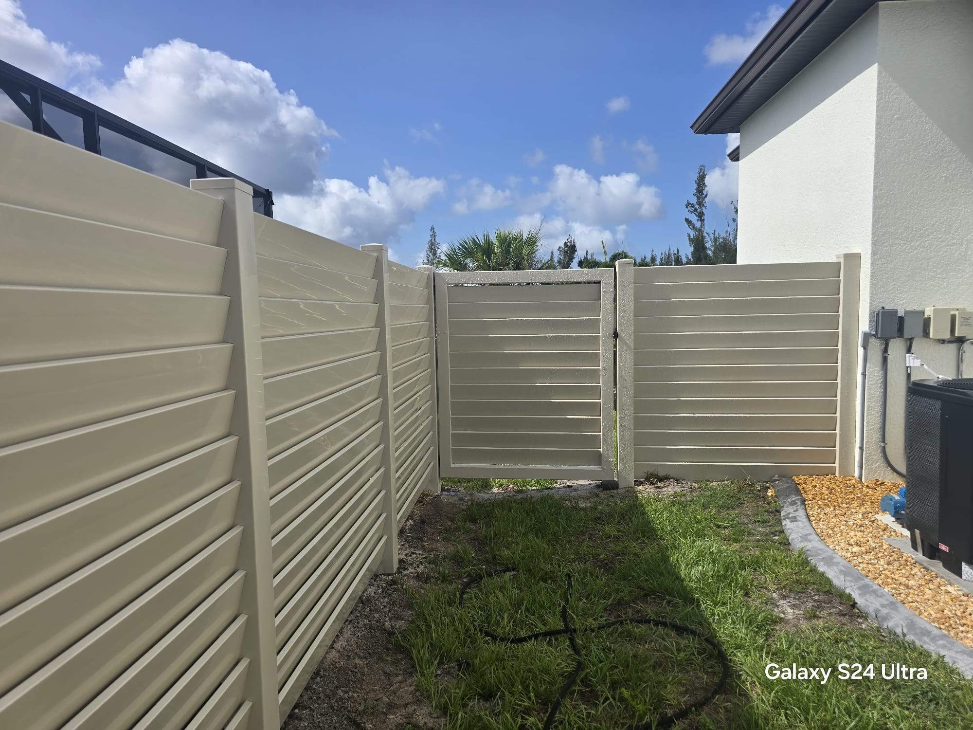 Tan Louvered Vinyl in Port Charlotte by True Fence LLC