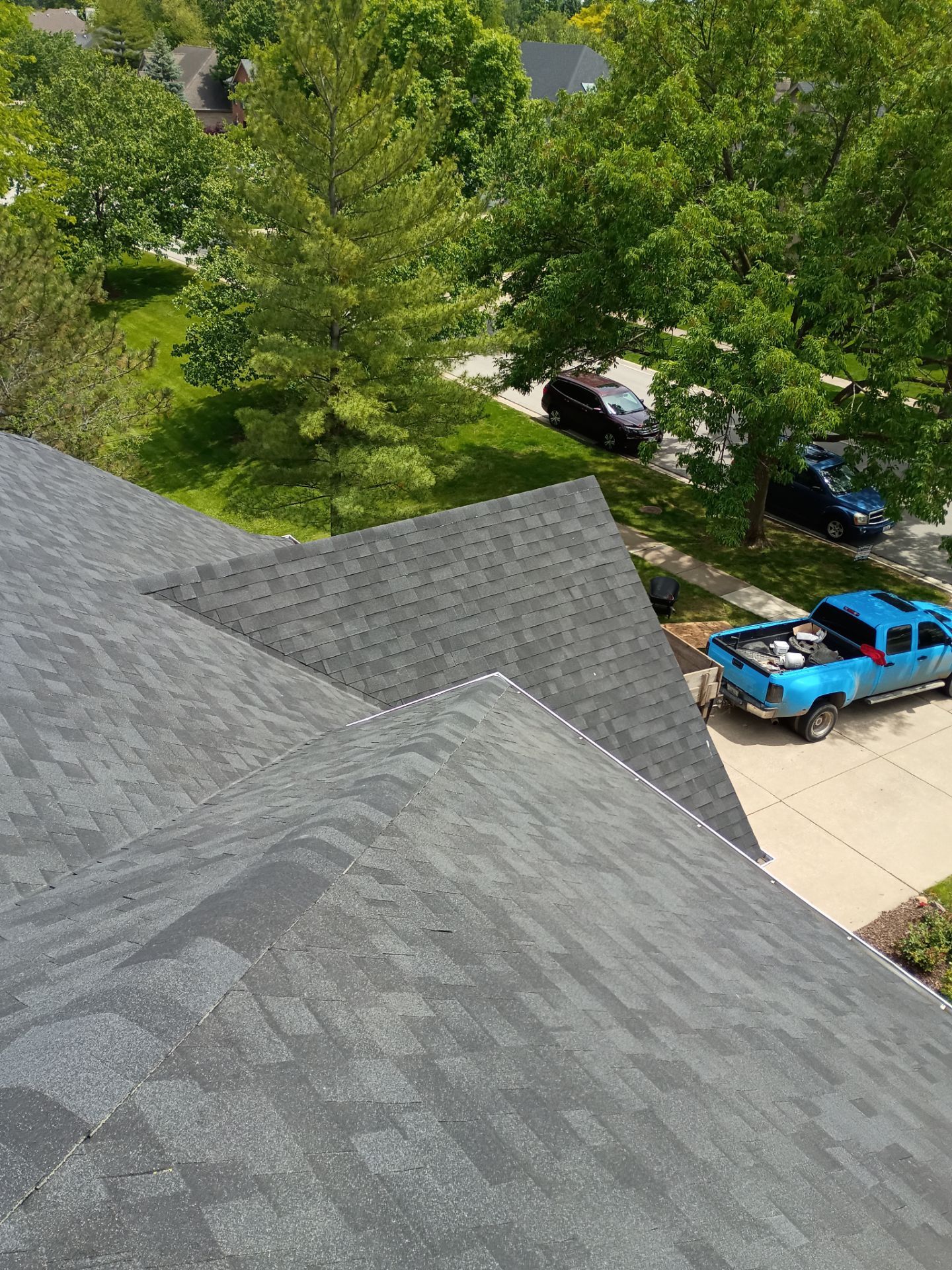 Asphalt Shingle Roof Replacement and Skylight Installation in Darien by Pro Home Services Inc
