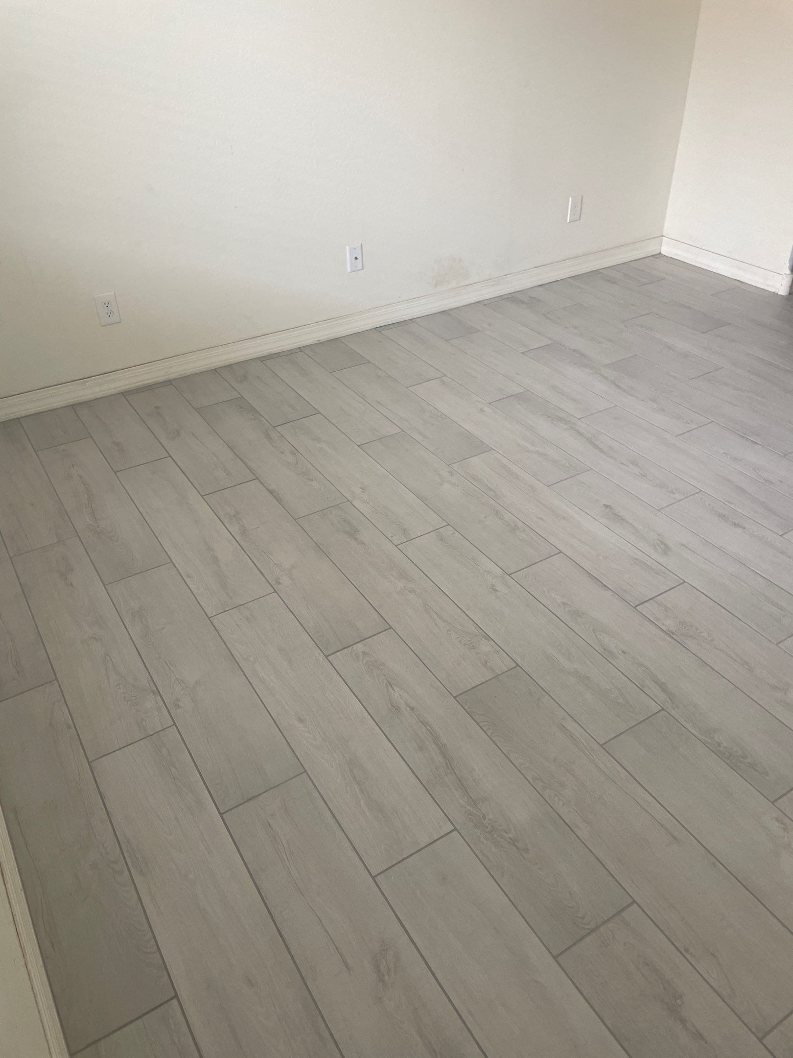 Wood Look Tile Floors and an Extra Large Shower  by Footprints Floors of Chandler 