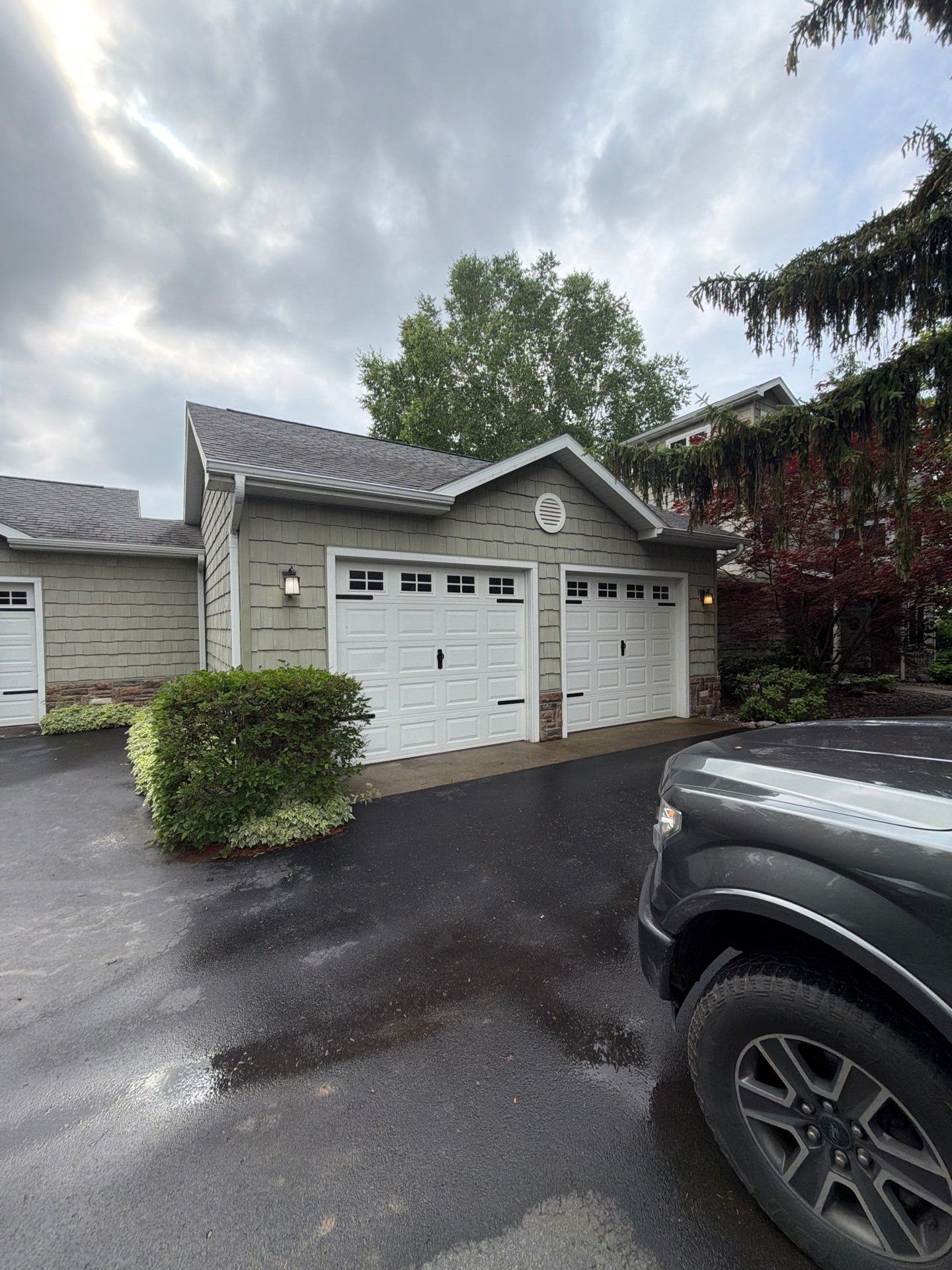 Gutter Helmet Protection System for Suttons Bay Home with Cedar Siding by Rainbow Seamless Systems