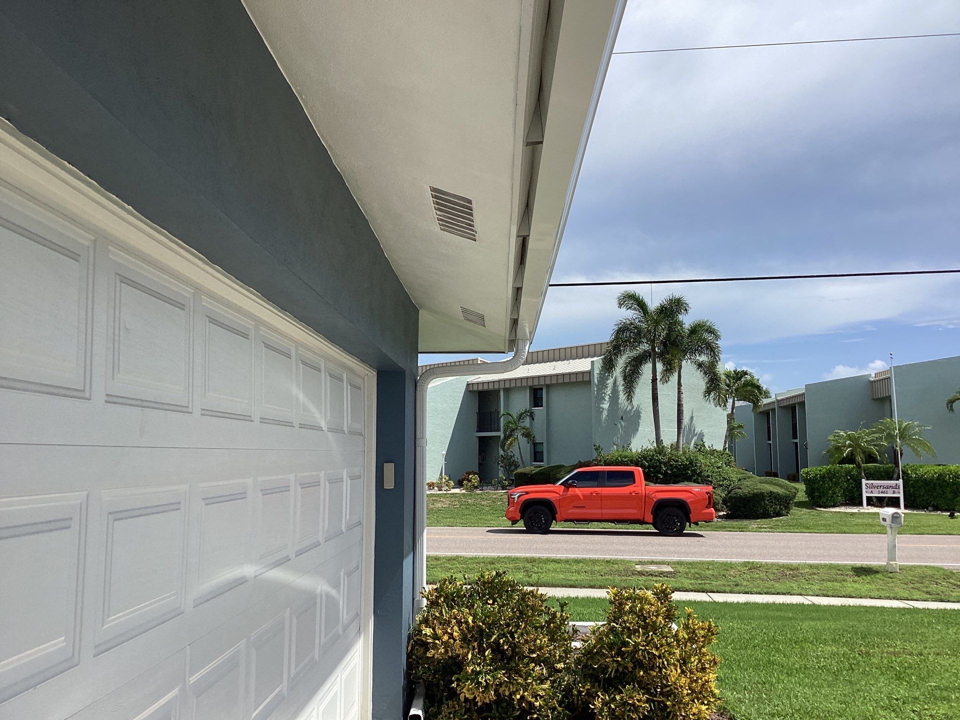 White Downspouts and Gutters Combo in Punta Gorda FL by Gutter Professors