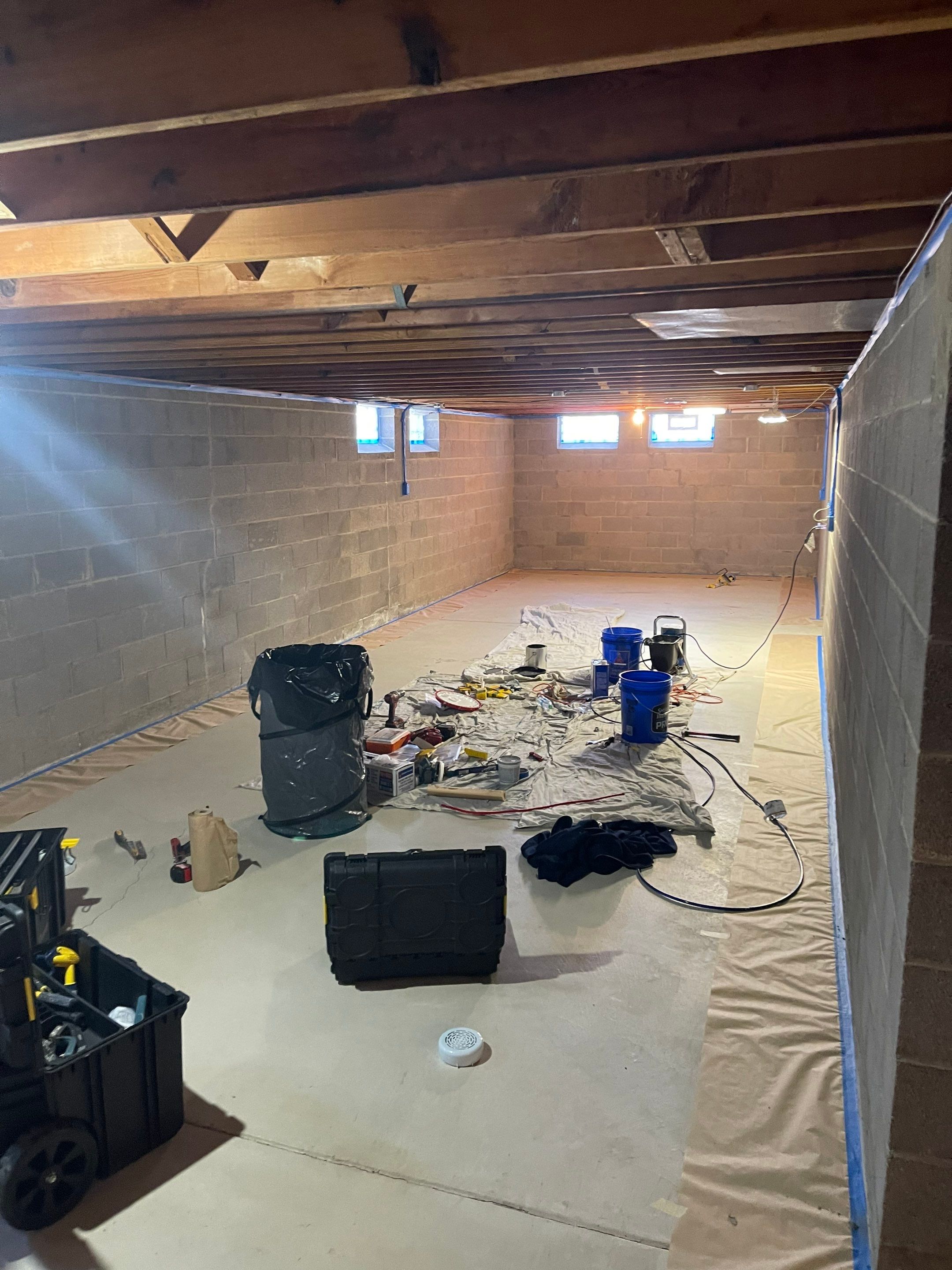 Flooring Installation and Basement Wall Painting using DryLok Extreme by Callaway Contracting LLC