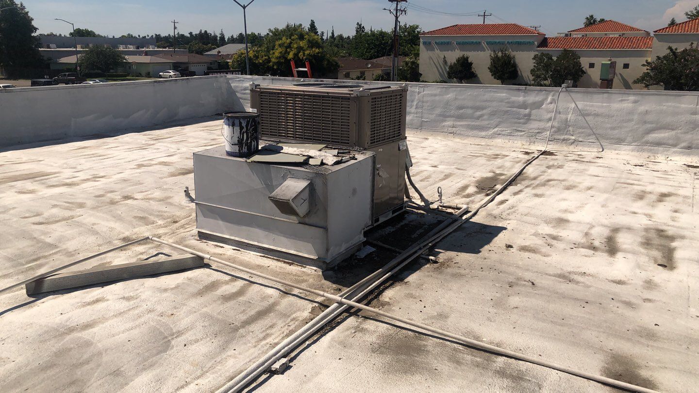 Reburbish existing spray foam job by Straight Edge Roofing Inc