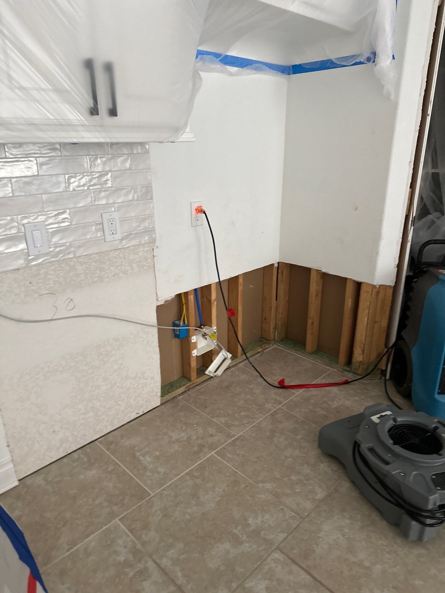 Kitchen Remodel using Water mitigation equipment by L&T General Contractors and Restoration INC
