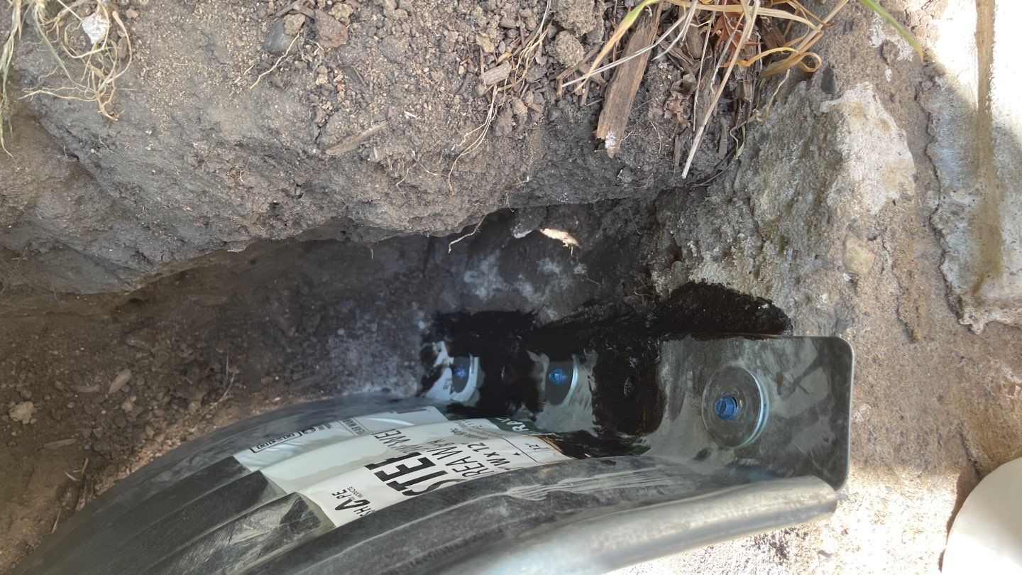 Drain Tile, Window Wells & Buried Discharge in Minneapolis by Waterproofing Northeast