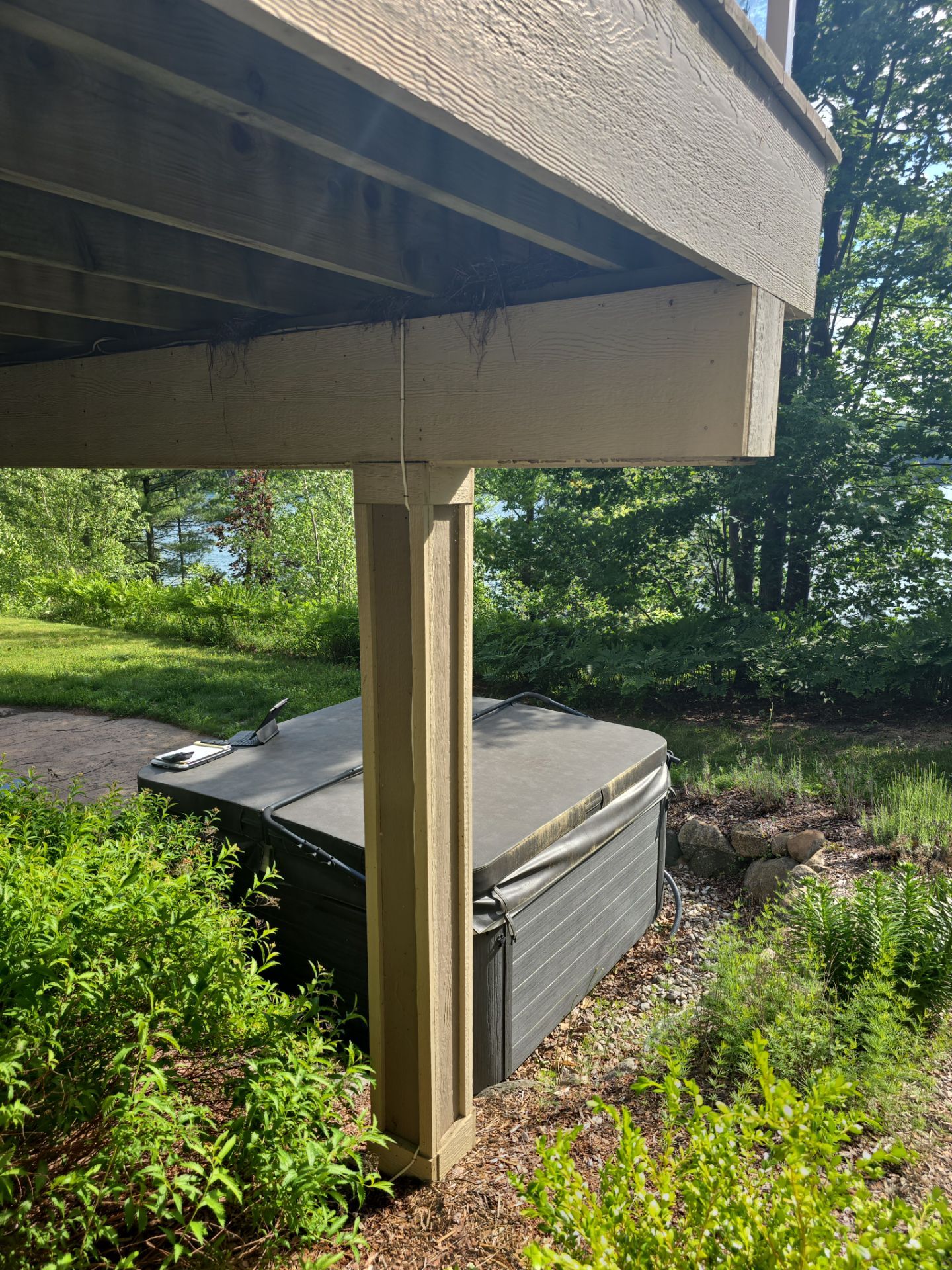 Traverse City Underdecking Installation with Integrated Seamless Gutter System by Rainbow Seamless Systems