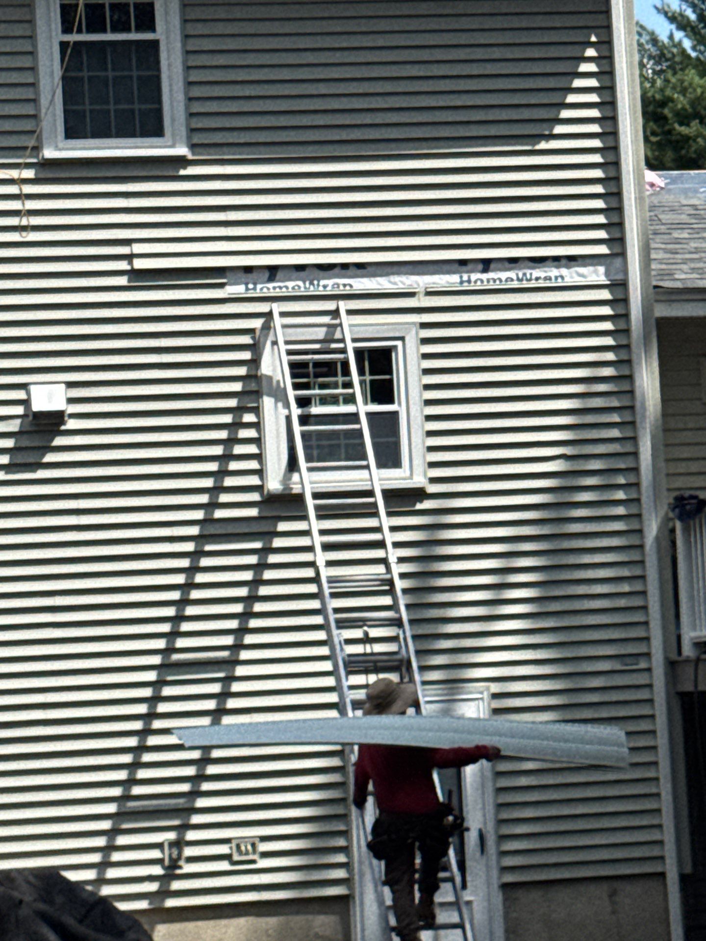 Complete Roof Replacement with Chimney Flashing, Gutter Guard System, and Vinyl Siding Repairs by Mighty Dog Roofing of Greater Middlesex County