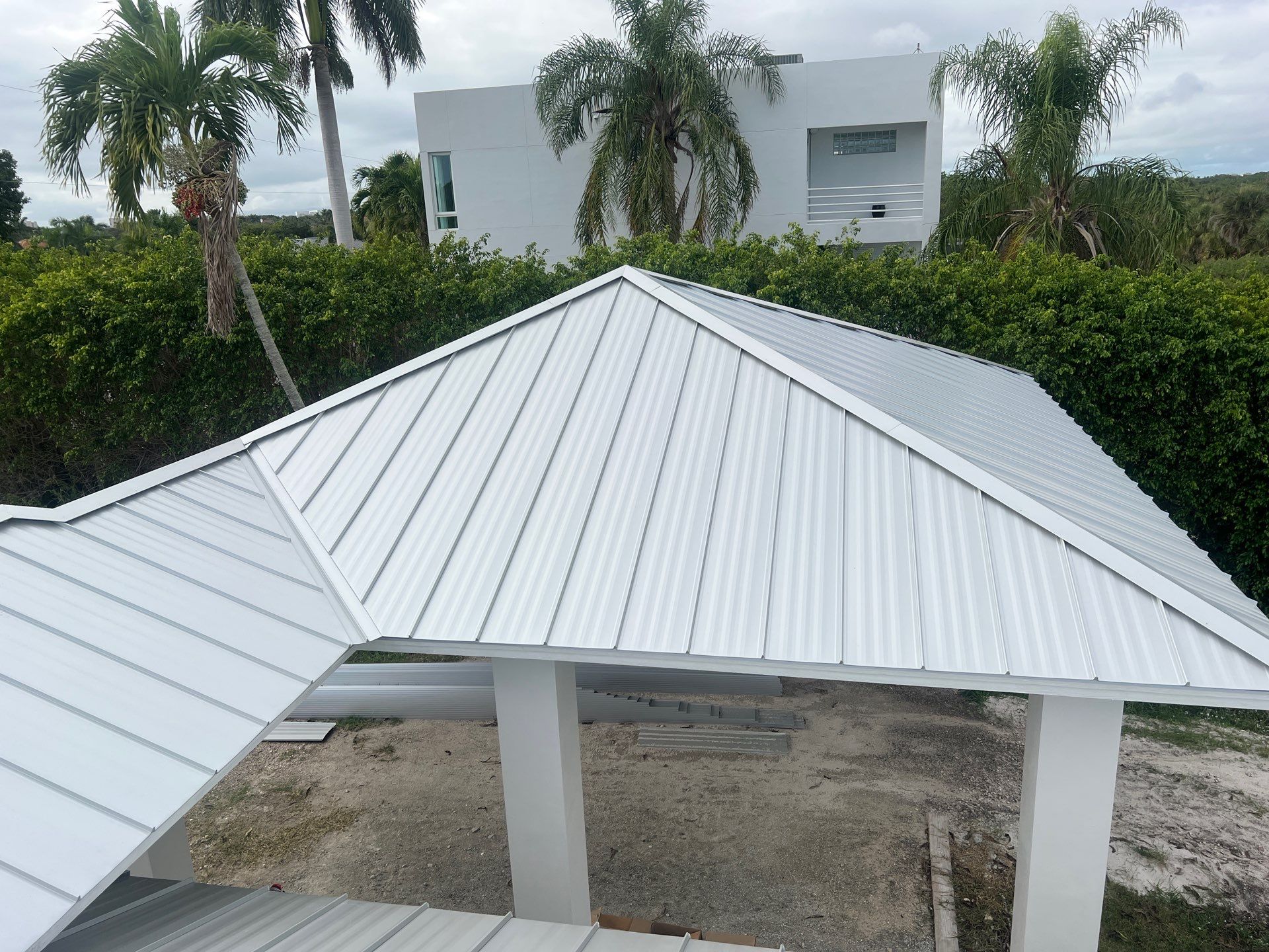 Residential Roofing Installation using Galvalume Standing Seam by Durabilis Roofing INC