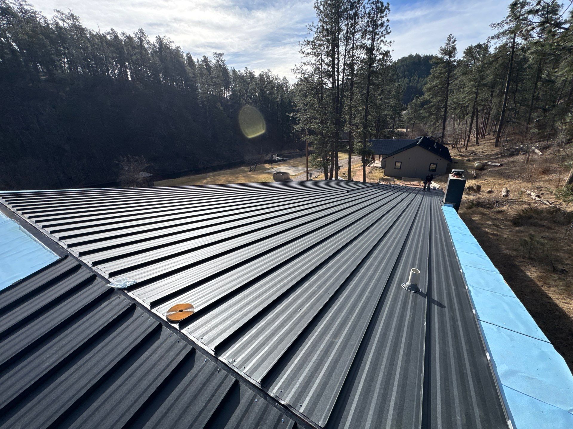 Residential Roofing Installation using Steel Roofing by Weather-Tite Exteriors LLC