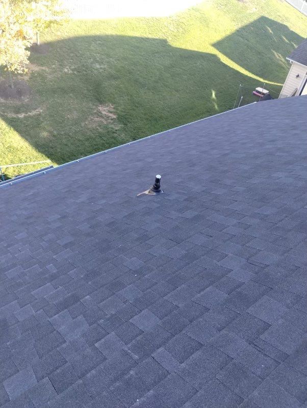 Residential Roofing Installation using Atlas Pinnacle Pristine Black Architectural Shingles by Frederick Roof Repair