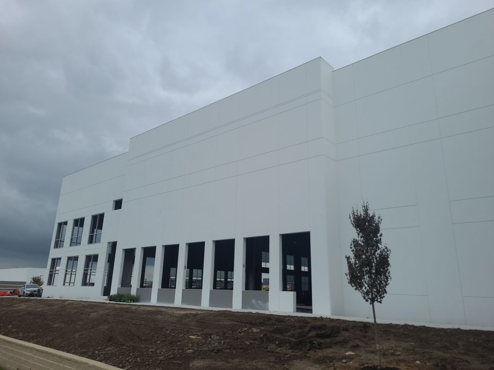 Warehouse Construction using Hallman Lindsay Vertical Concrete Stain 167 by Blair Commercial Painting, LLC