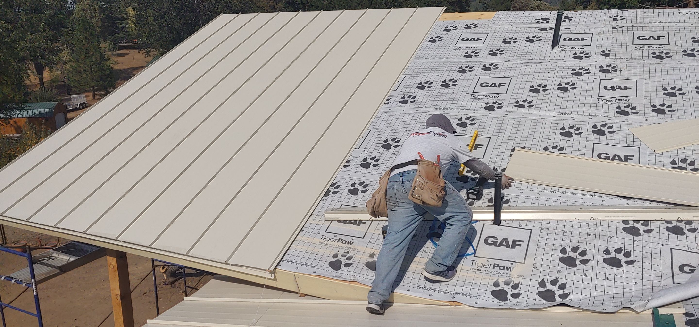 Residential Roofing Installation using Standing seam metal roofing system by Straight Edge Roofing Inc