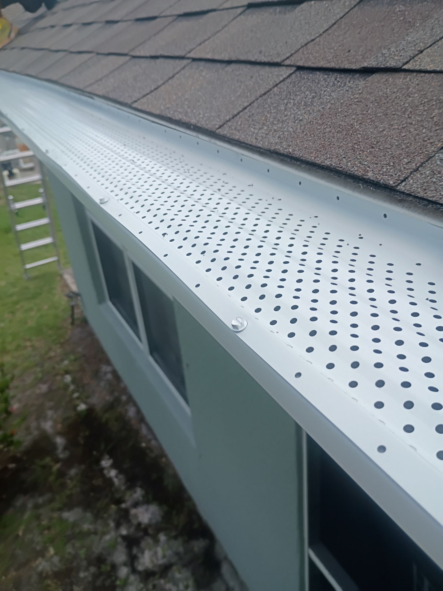 Gutter Guard and New Downspouts Installation in Punta Gorda FL by Gutter Professors
