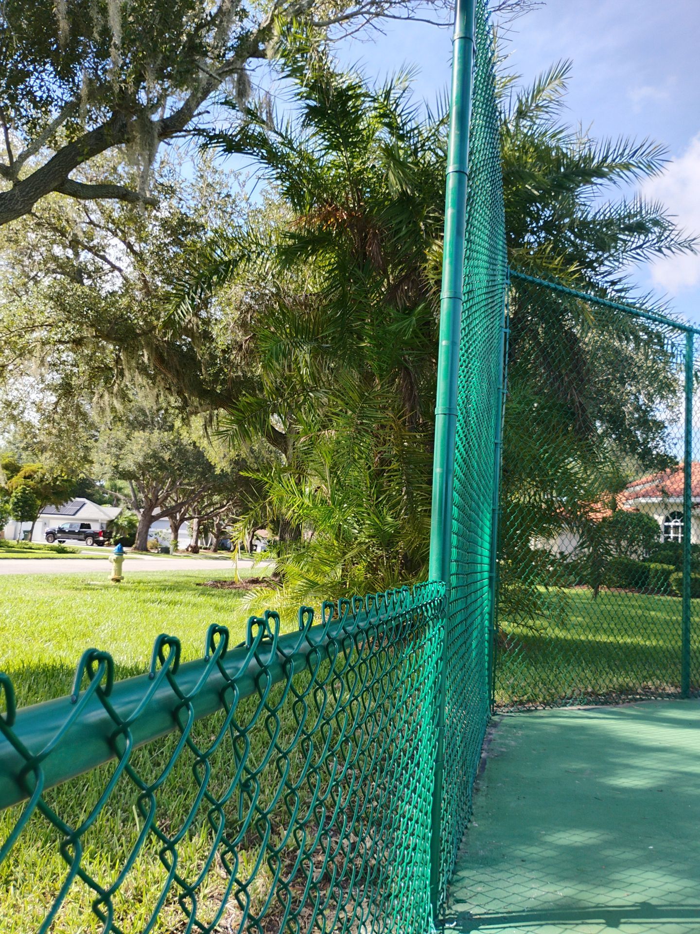 Commercial Tennis Court Chain Link Fence Repair in Sarasota by True Fence LLC