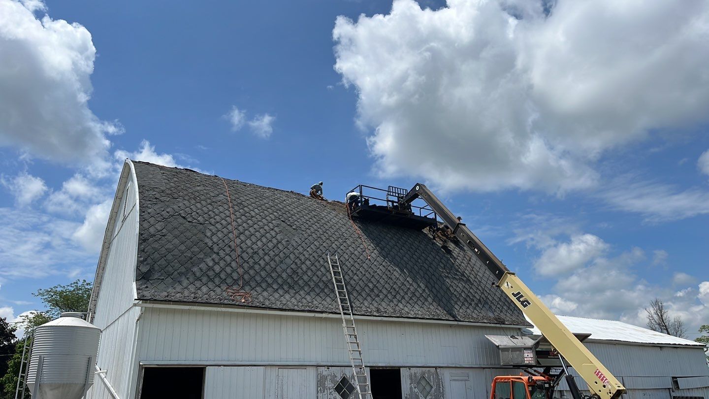 Barn Roofing Installation using GAF Timberline HDZ Charcoal by Nitro Roofing and Construction